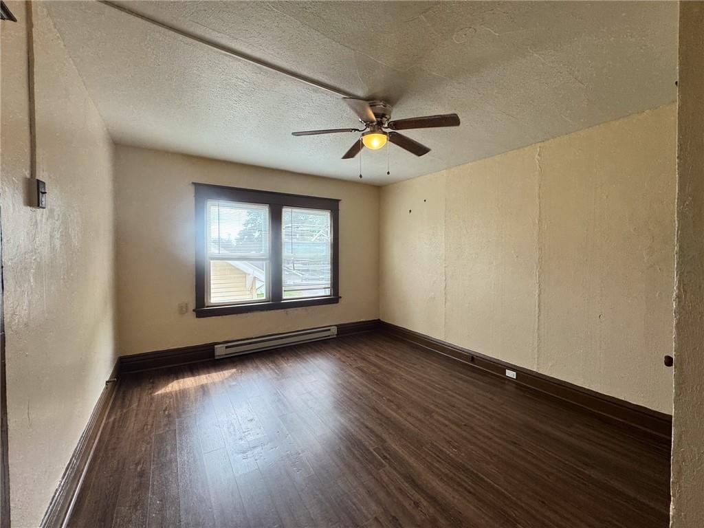 811 Wilmington Road, Unit 6 New Castle, PA 16101 - Photo 13 of 16 wooden floor in an empty room with a window