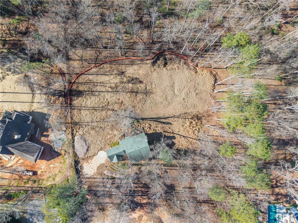 16520 Hopewell Road Alpharetta, GA 30004 - Photo 2 of 6 a backyard of a house with lots of green space