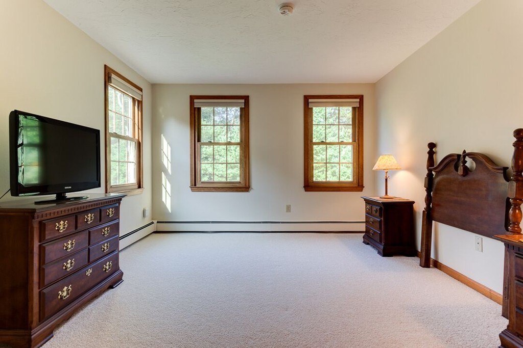 20 Indigo Farm Road North Smithfield, RI 02830 - Photo 11 of 30 a living room with furniture and a flat screen tv