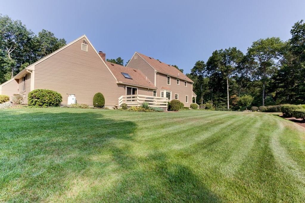 20 Indigo Farm Road North Smithfield, RI 02830 - Photo 13 of 30 a front view of a house with garden