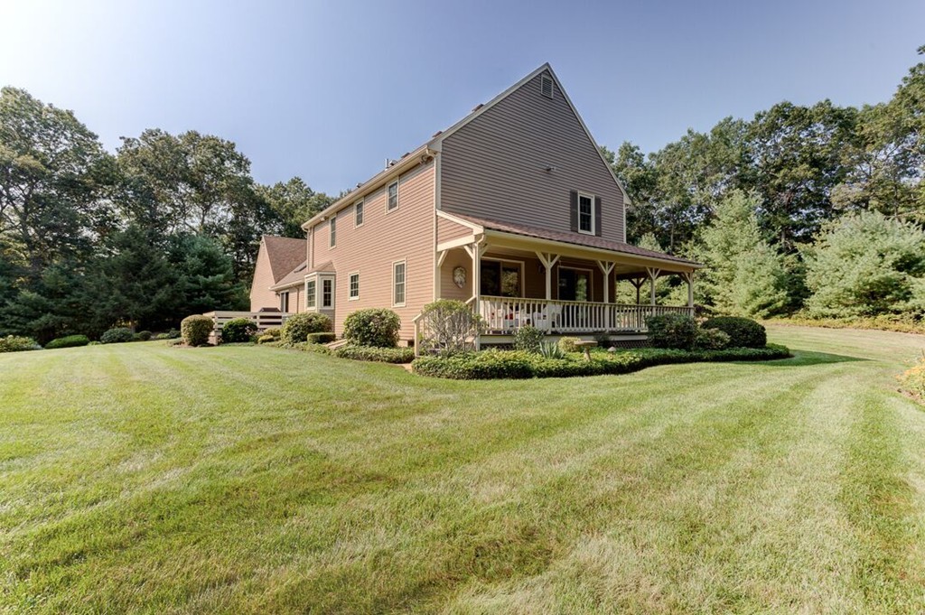 20 Indigo Farm Road North Smithfield, RI 02830 - Photo 14 of 30 a front view of a house with a yard