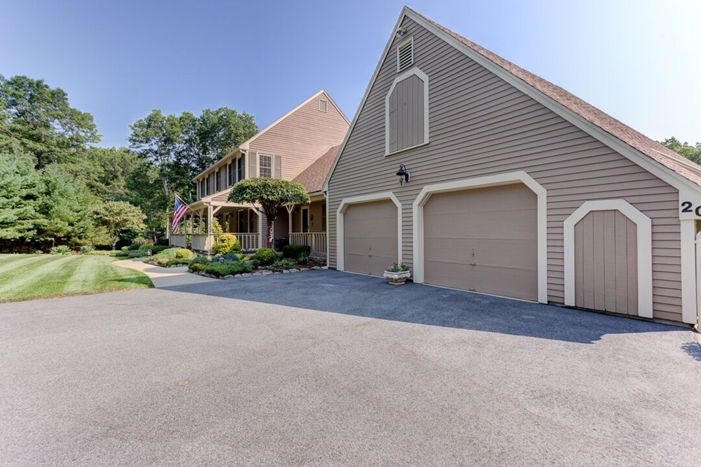 20 Indigo Farm Road North Smithfield, RI 02830 - Photo 17 of 30 a view of a house with a yard and garage