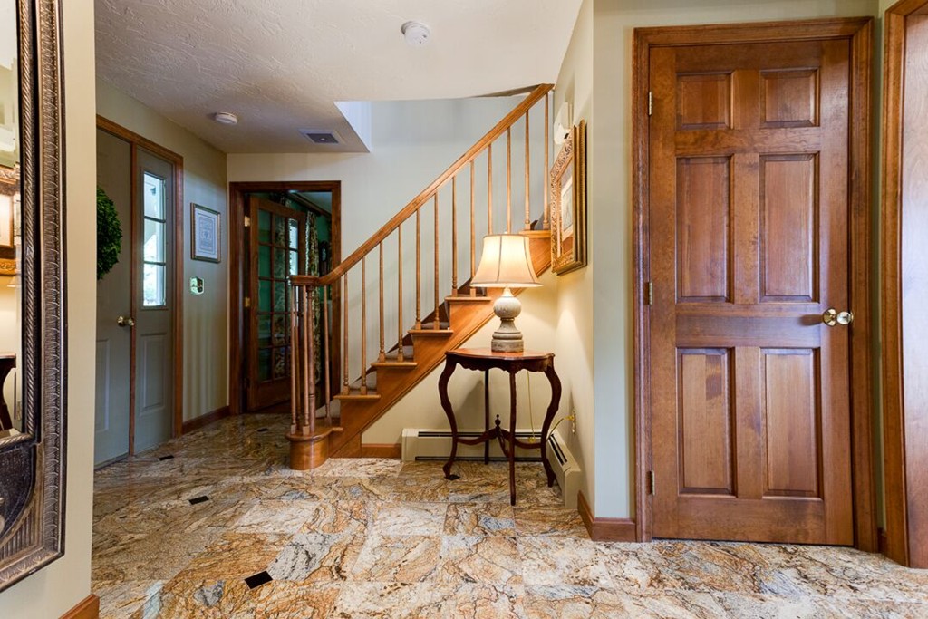 20 Indigo Farm Road North Smithfield, RI 02830 - Photo 29 of 30 a view of a hallway with wooden floor and staircase