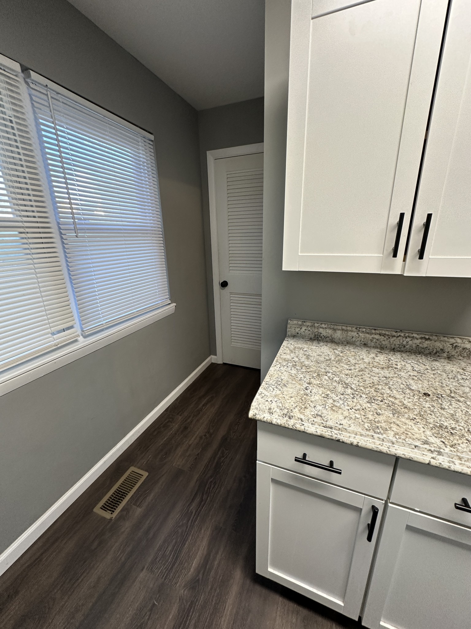 69 Hasty Hollow Road Lynchburg, TN 37352 - Photo 11 of 20 a bathroom with a granite countertop sink and dishwasher