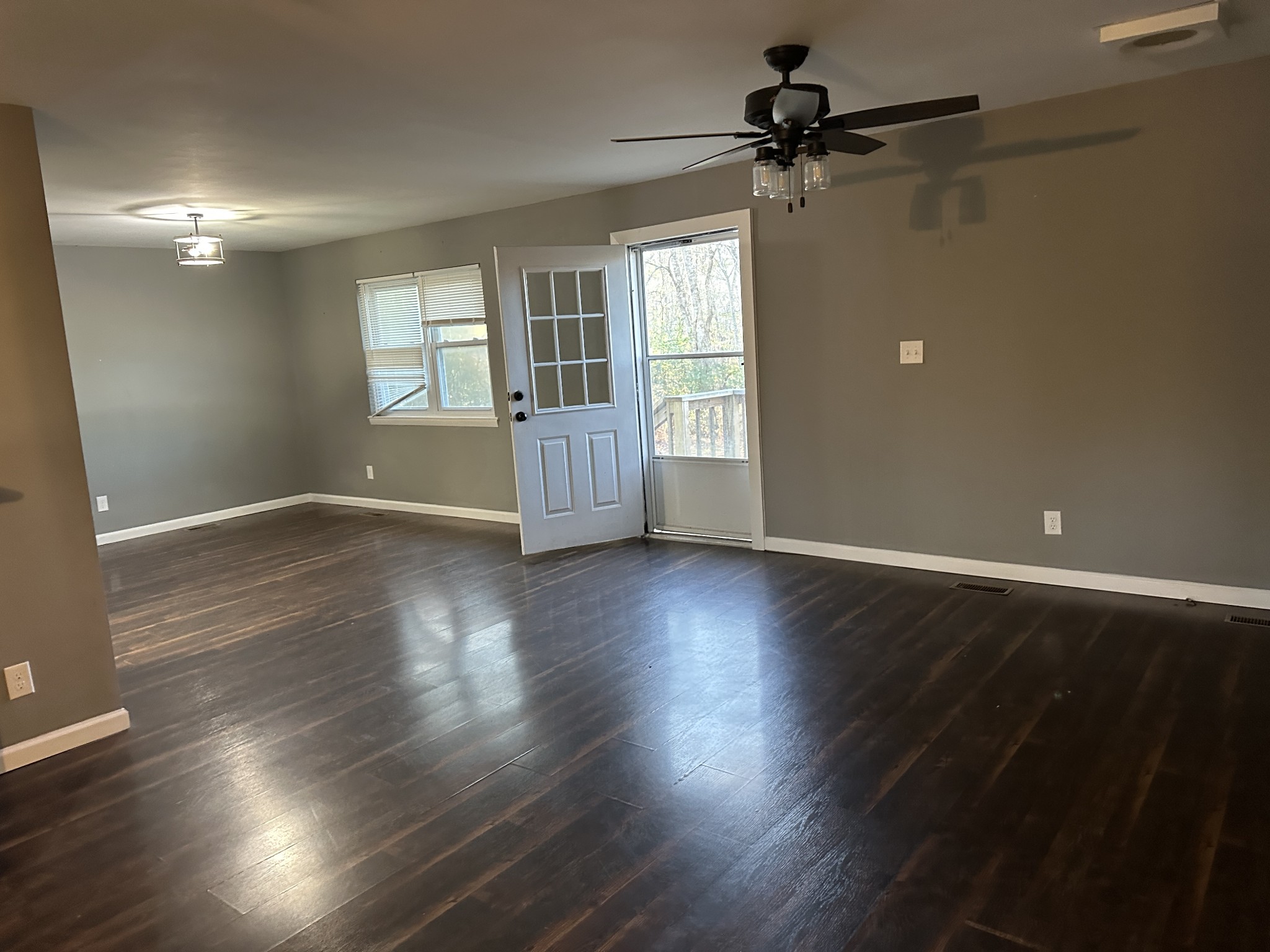 69 Hasty Hollow Road Lynchburg, TN 37352 - Photo 14 of 21 a view of an empty room with a window and wooden floor