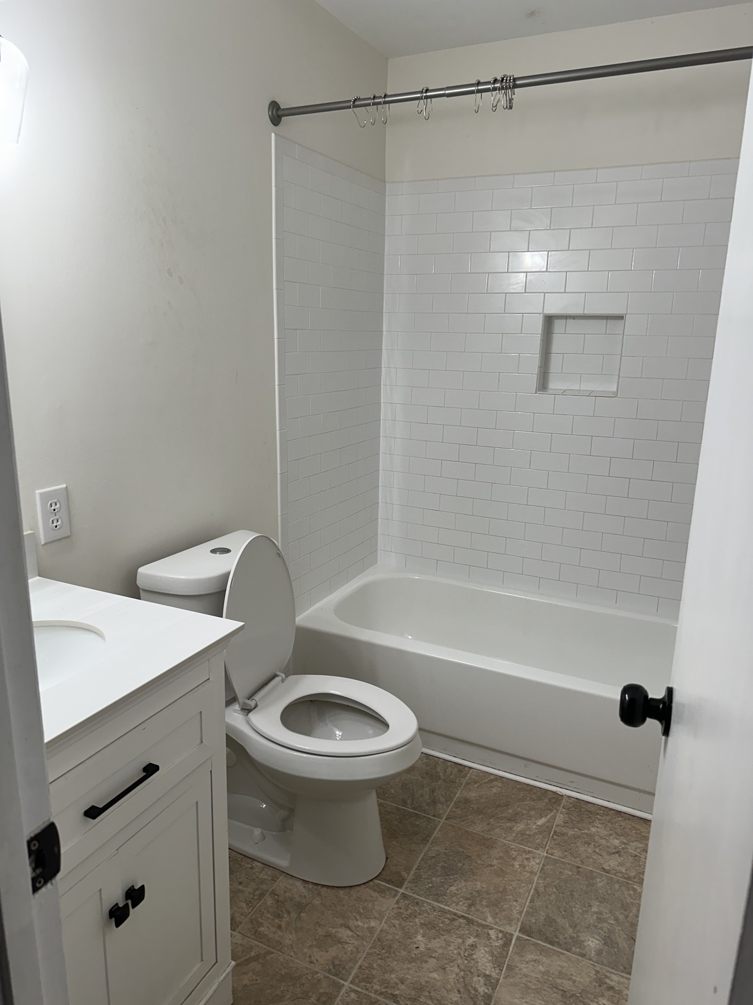 69 Hasty Hollow Road Lynchburg, TN 37352 - Photo 17 of 20 a bathroom with a sink a toilet and a bathtub