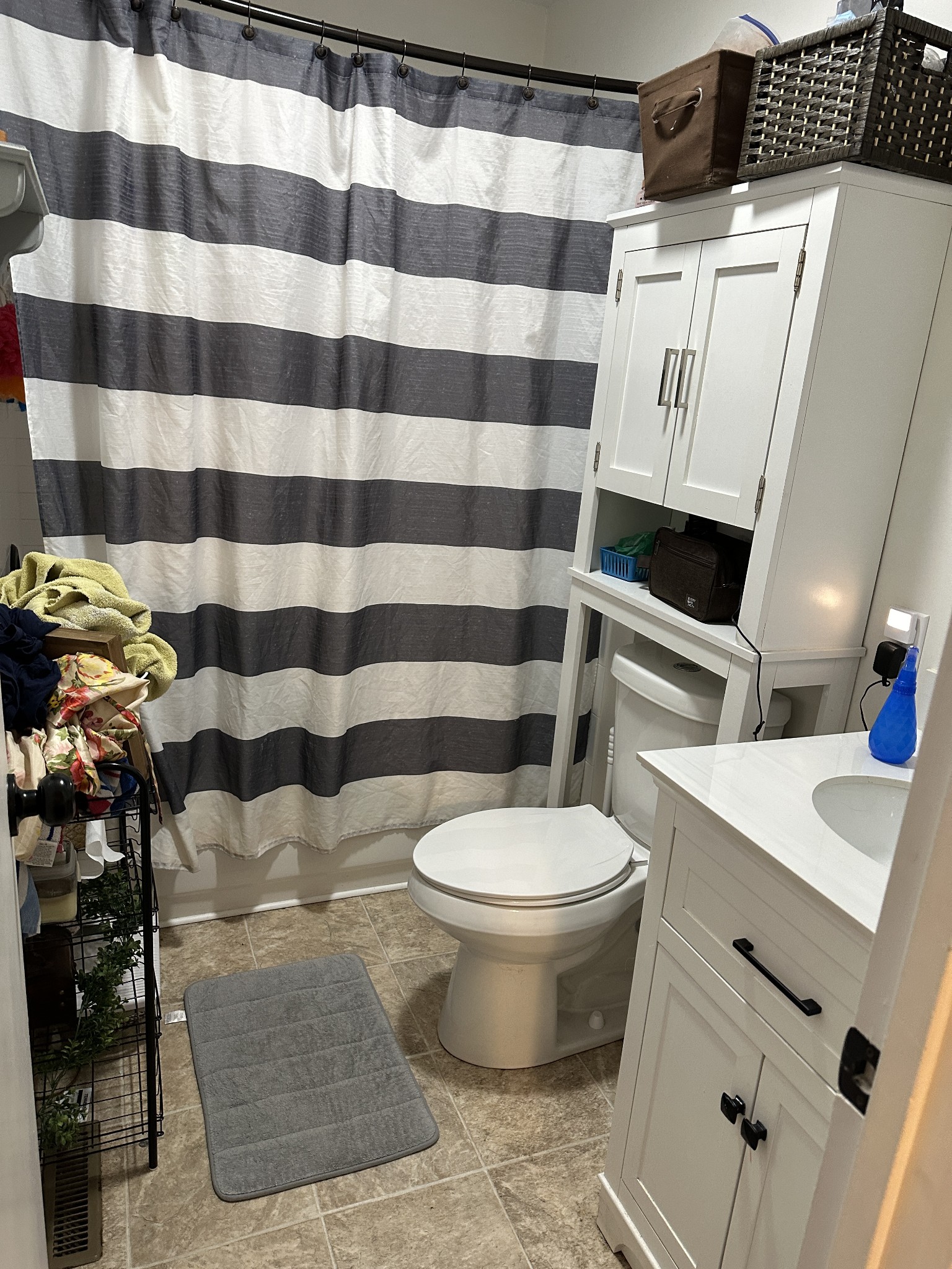 69 Hasty Hollow Road Lynchburg, TN 37352 - Photo 3 of 21 a bathroom with a sink toilet and shower