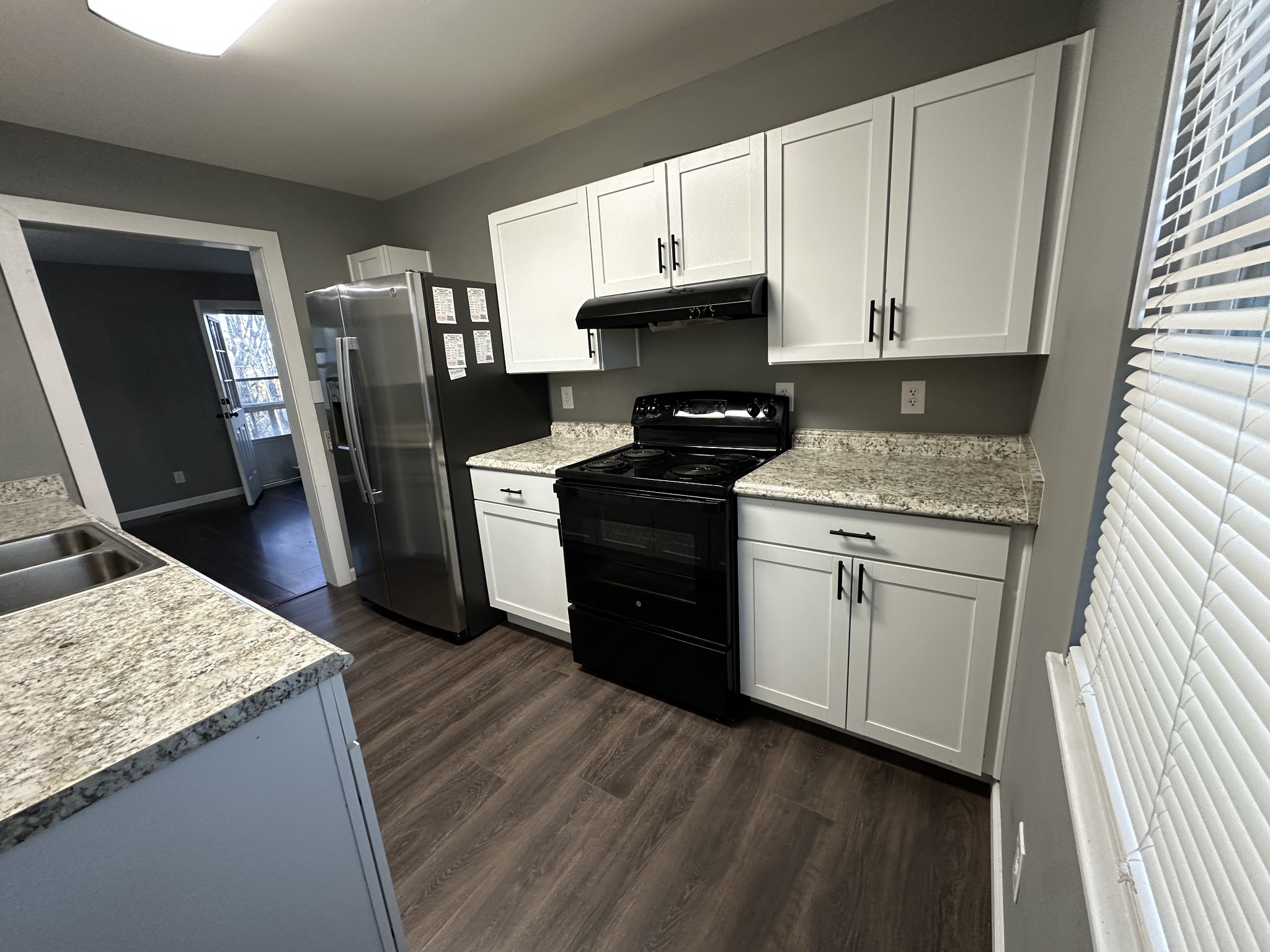 69 Hasty Hollow Road Lynchburg, TN 37352 - Photo 7 of 21 a kitchen with a sink stove and refrigerator