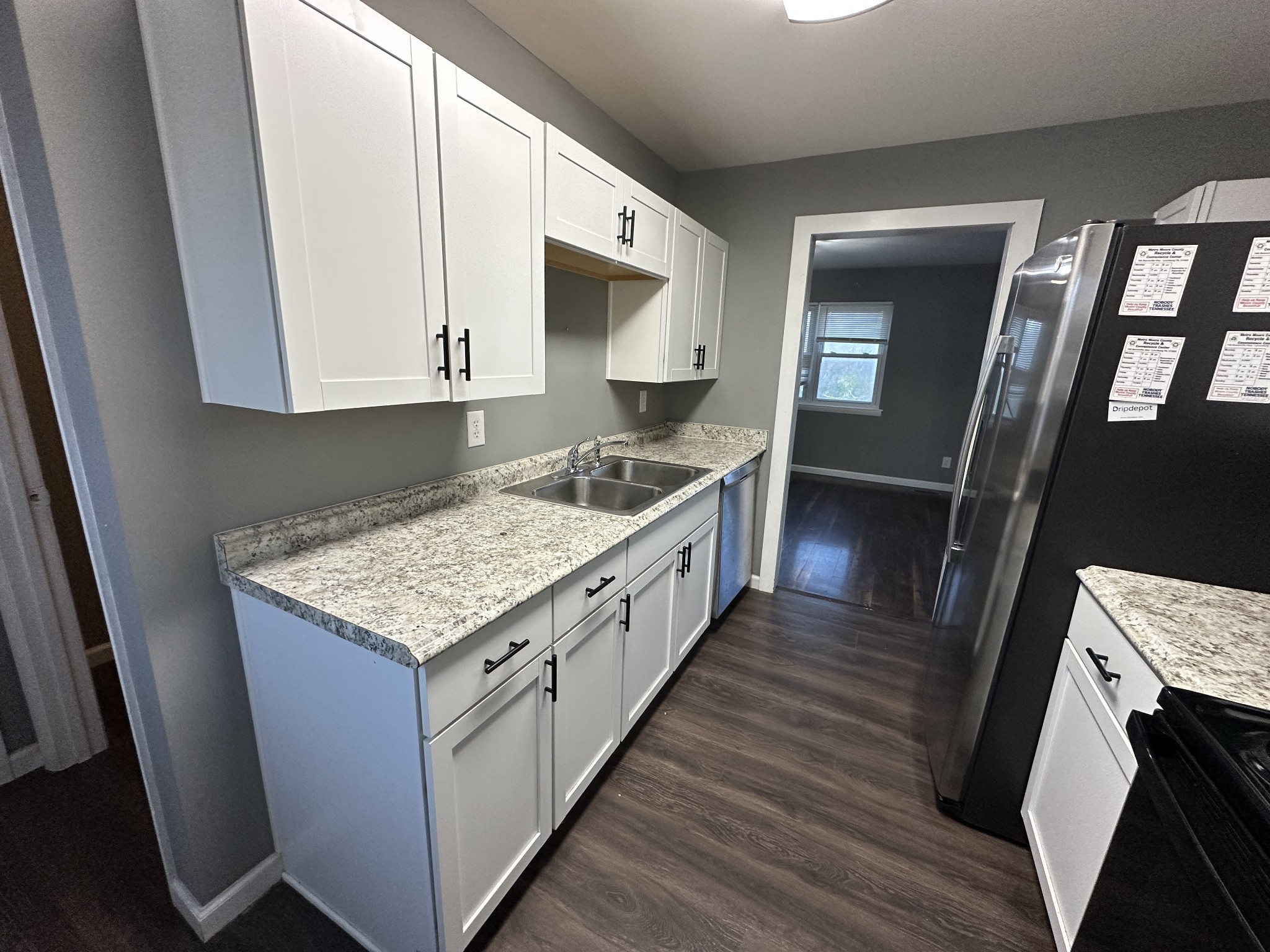 69 Hasty Hollow Road Lynchburg, TN 37352 - Photo 10 of 21 a kitchen with stove cabinets and wooden floor