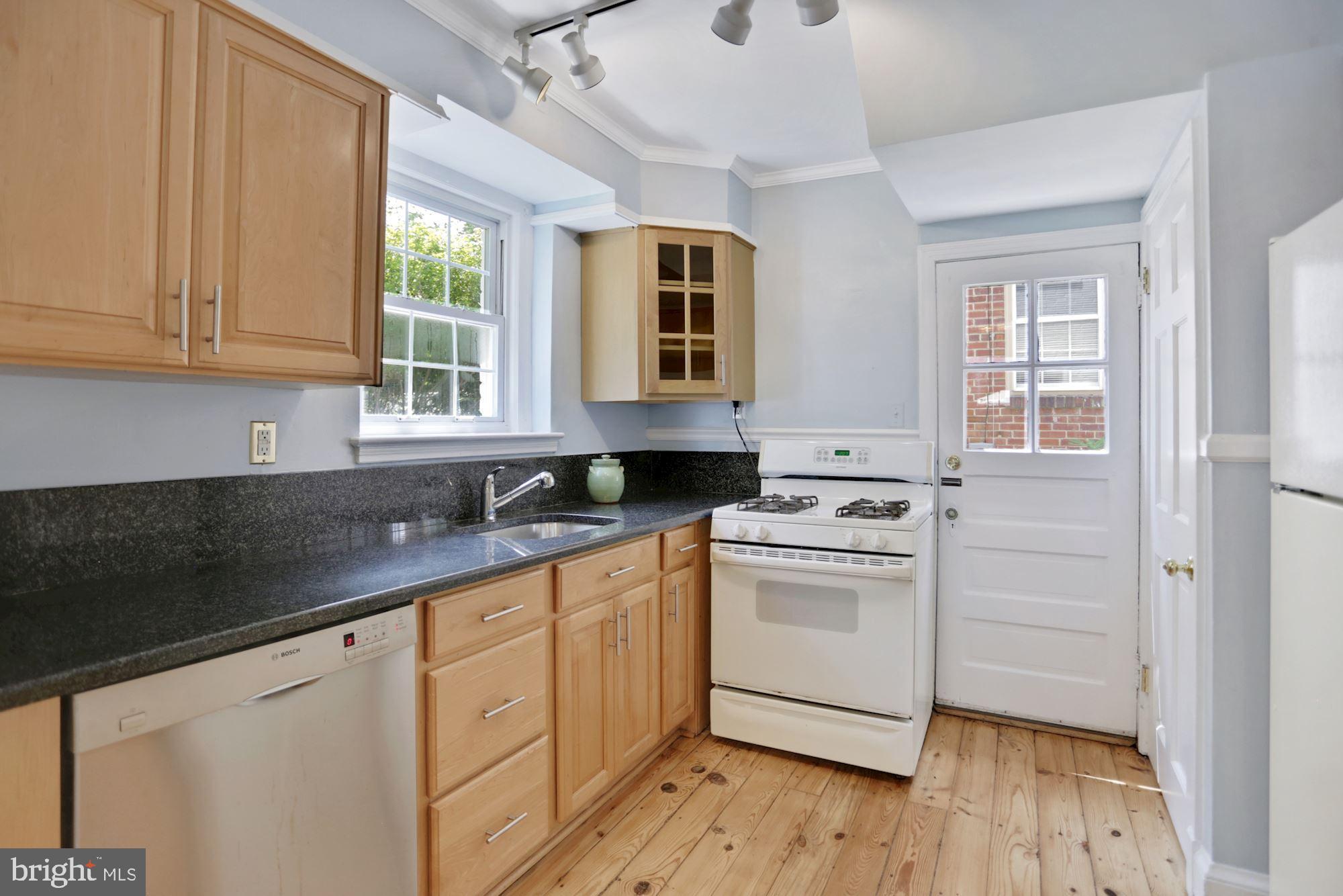 2810 Rittenhouse Street Northwest Washington, DC 20015 - Photo 13 of 24 with granite and maple cabinets