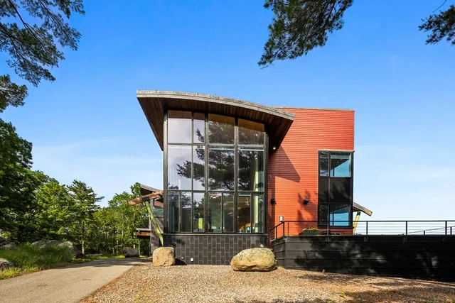 a view of a house with a small yard