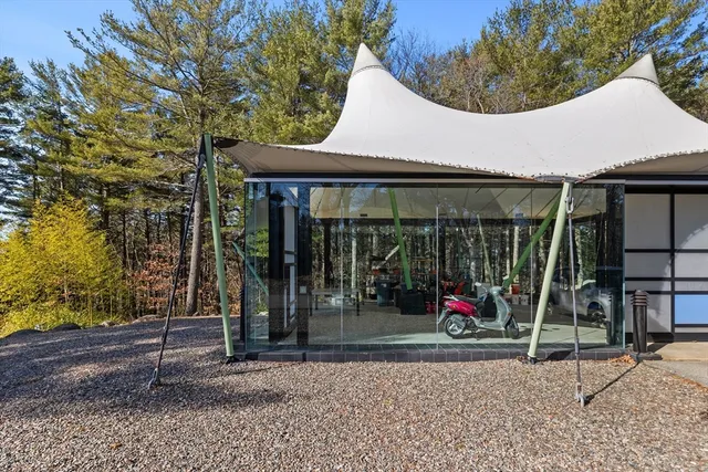 a view of a small white house