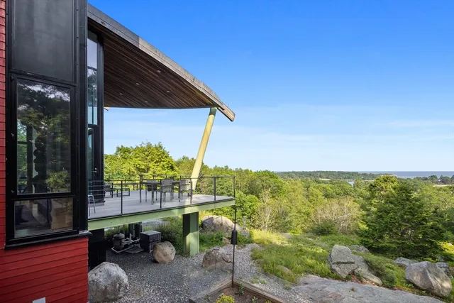 a view of a balcony with plants