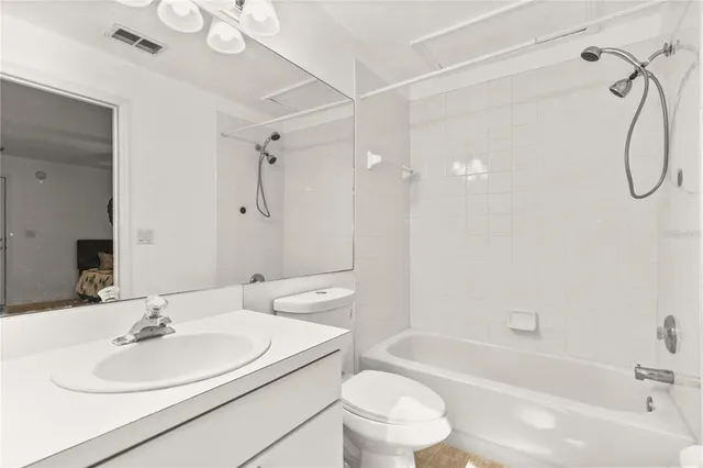 an aerial view of residential house with outdoor space