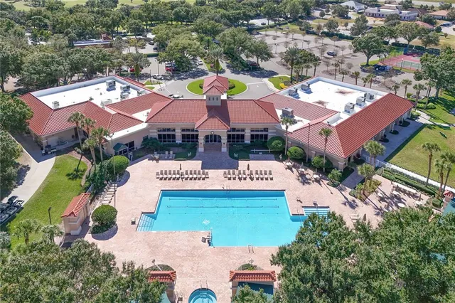 an aerial view of swimming pool and outdoor space