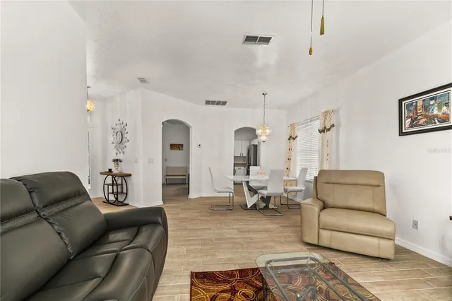 a living room with furniture and a couch