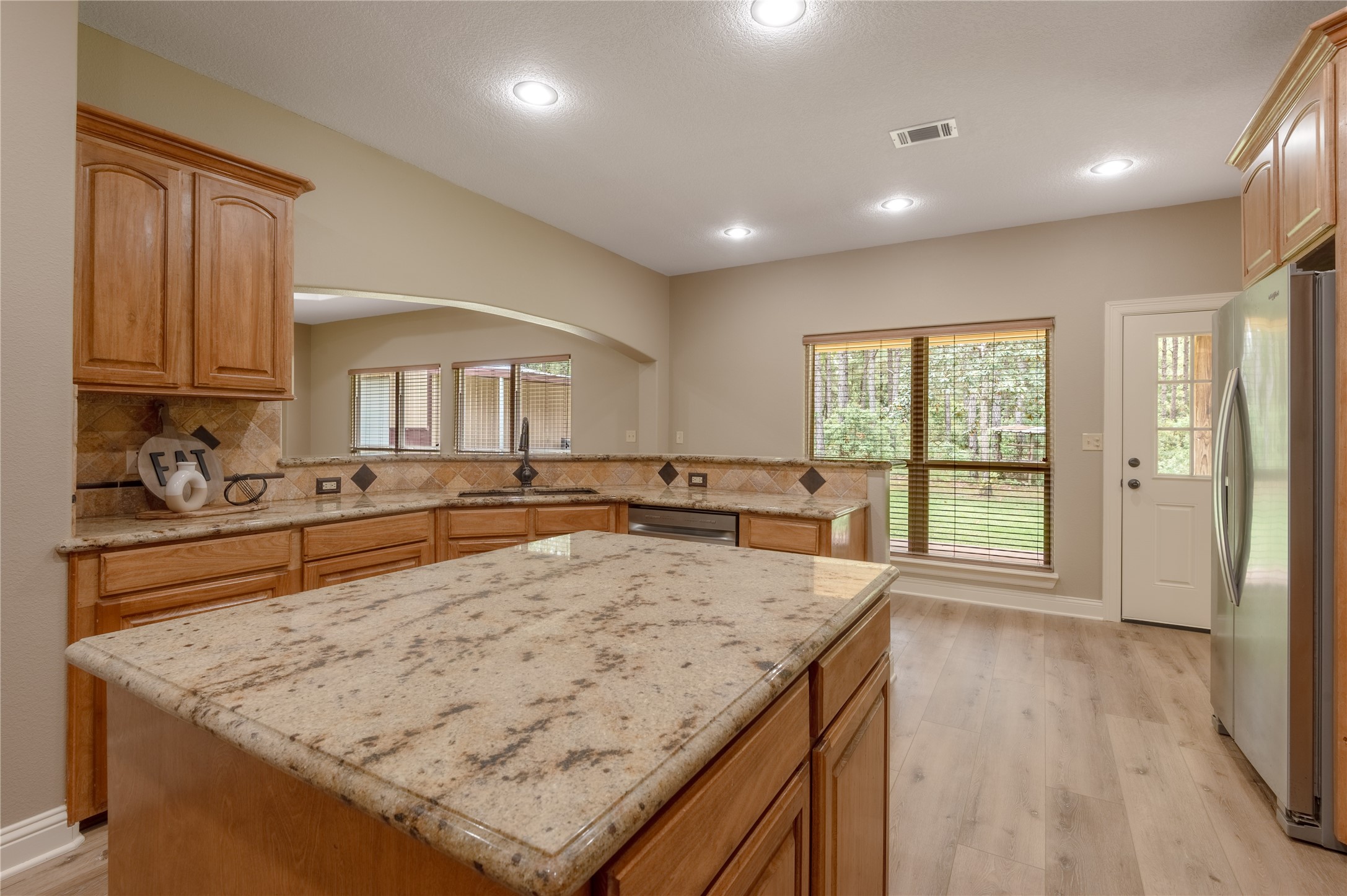 3134 Nursery Road Livingston, TX 77351 - Photo 17 of 50 From the kitchen, you have spectacular views of the forest behind the home!