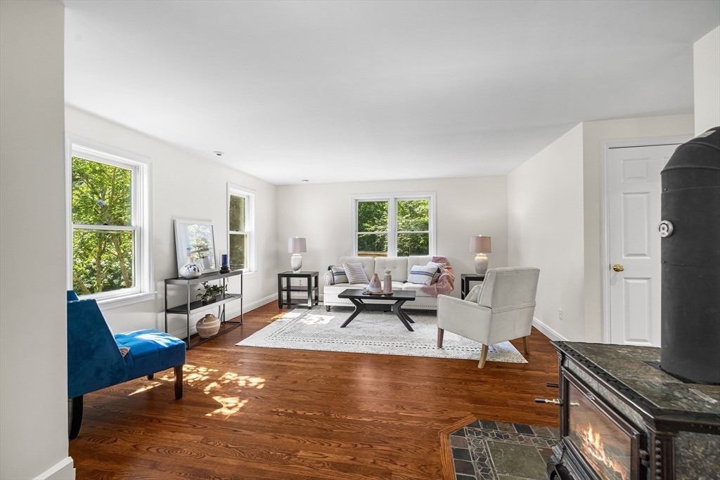 2 Wheeler Road Bolton, MA 01740 - Photo 6 of 37 a living room with furniture and a large window