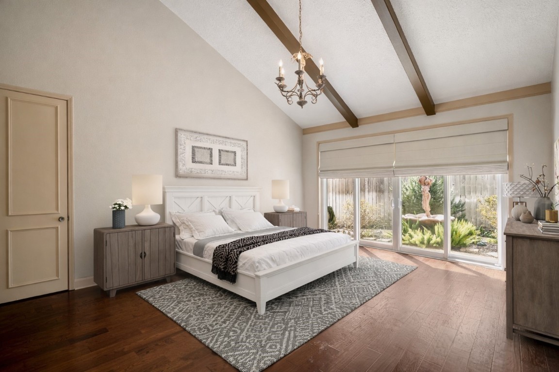 1306 Riverview Court Houston, TX 77077 - Photo 43 of 43 a spacious bedroom with a large bed and a chandelier