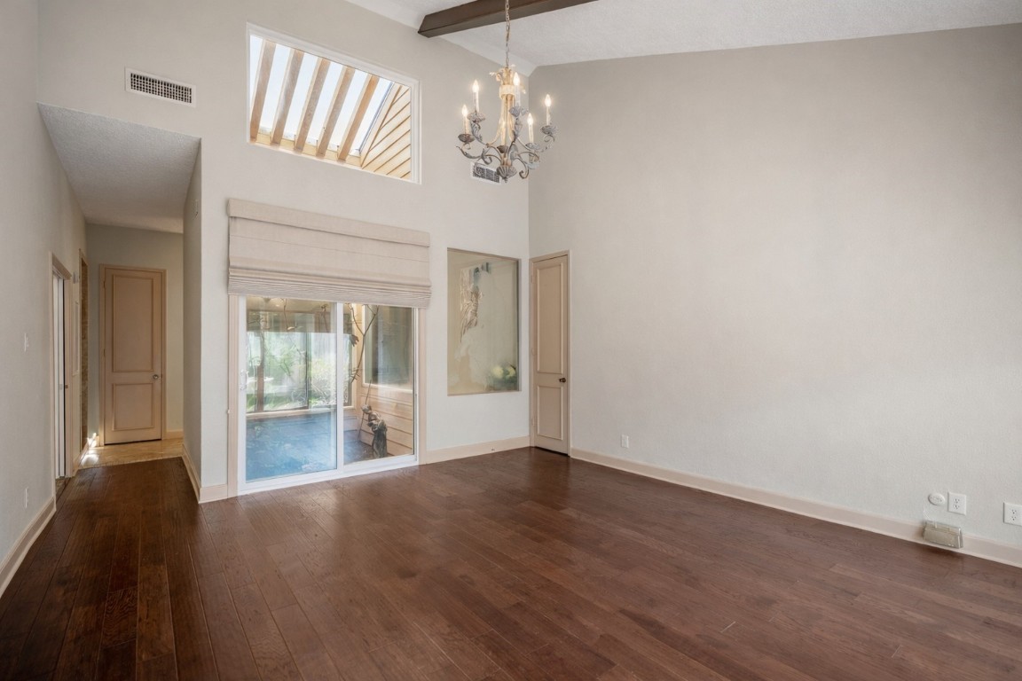1306 Riverview Court Houston, TX 77077 - Photo 24 of 43 wooden floor in an empty room with a window