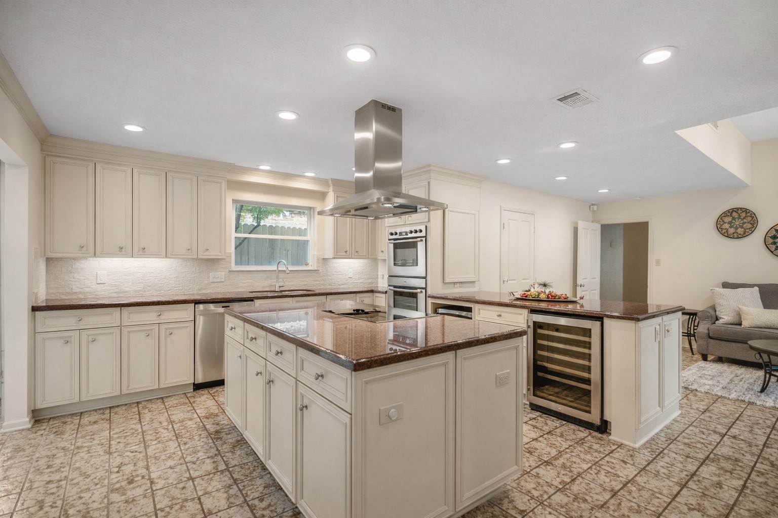 1306 Riverview Court Houston, TX 77077 - Photo 3 of 43 a kitchen with stainless steel appliances granite countertop a sink and stove