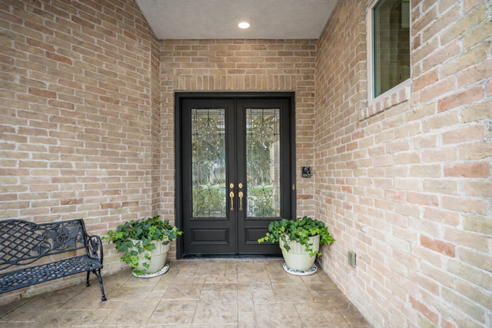 1306 Riverview Court Houston, TX 77077 - Photo 7 of 43 a front view of a house with potted plants