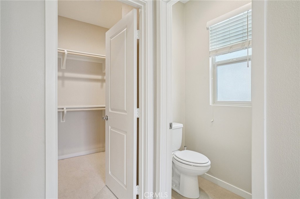 143 Frame Irvine, CA 92618 - Photo 16 of 41 a white toilet sitting next to a bathroom sink