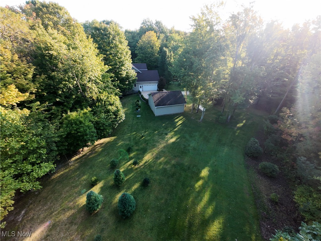 5232 Emerson Road Madison, OH 44057 - Photo 36 of 48 Aerial view of property and surrounding area featuring a forest