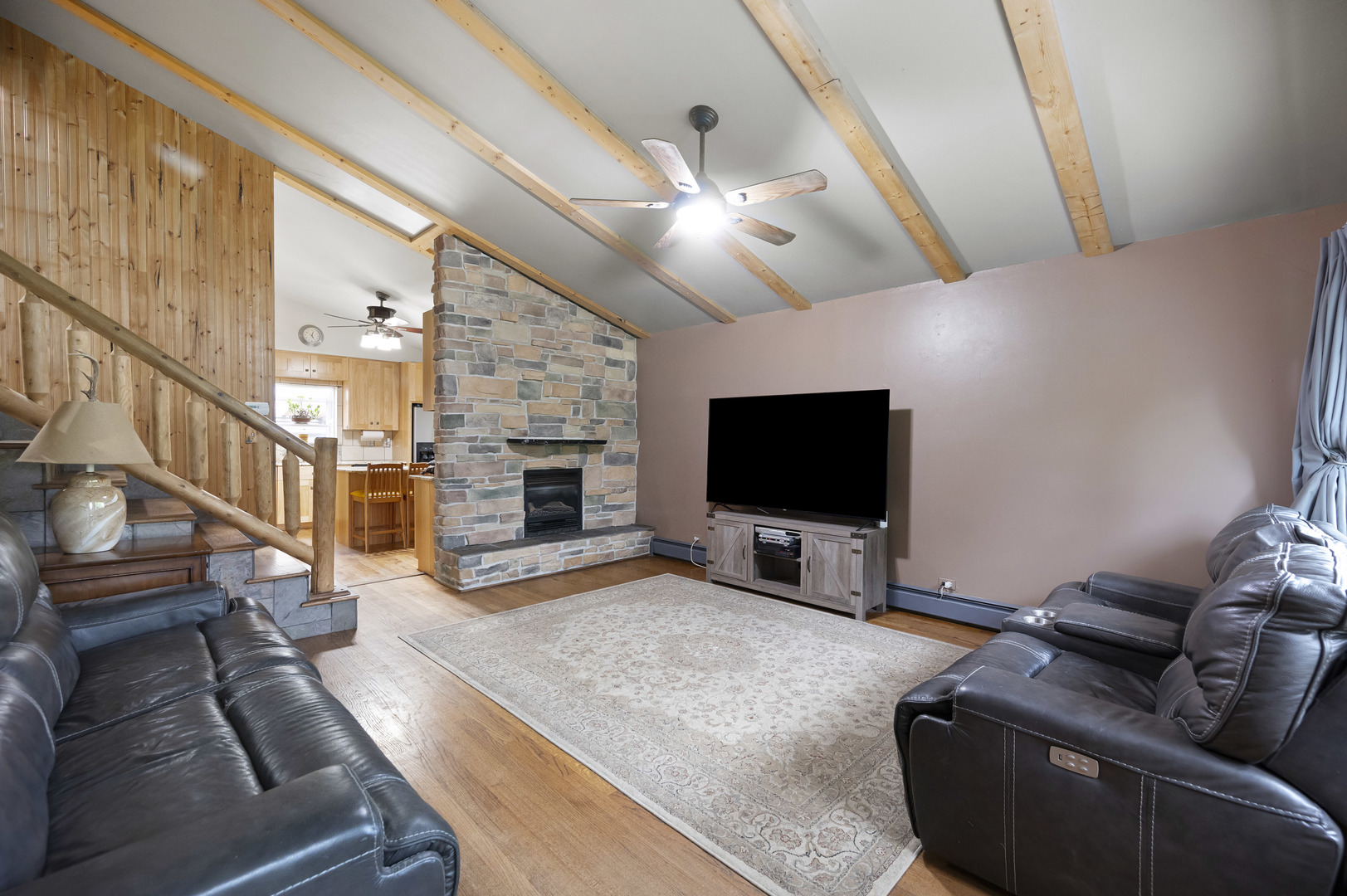 1011 Kohley Road Lisle, IL 60532 - Photo 3 of 26 a living room with furniture and a flat screen tv