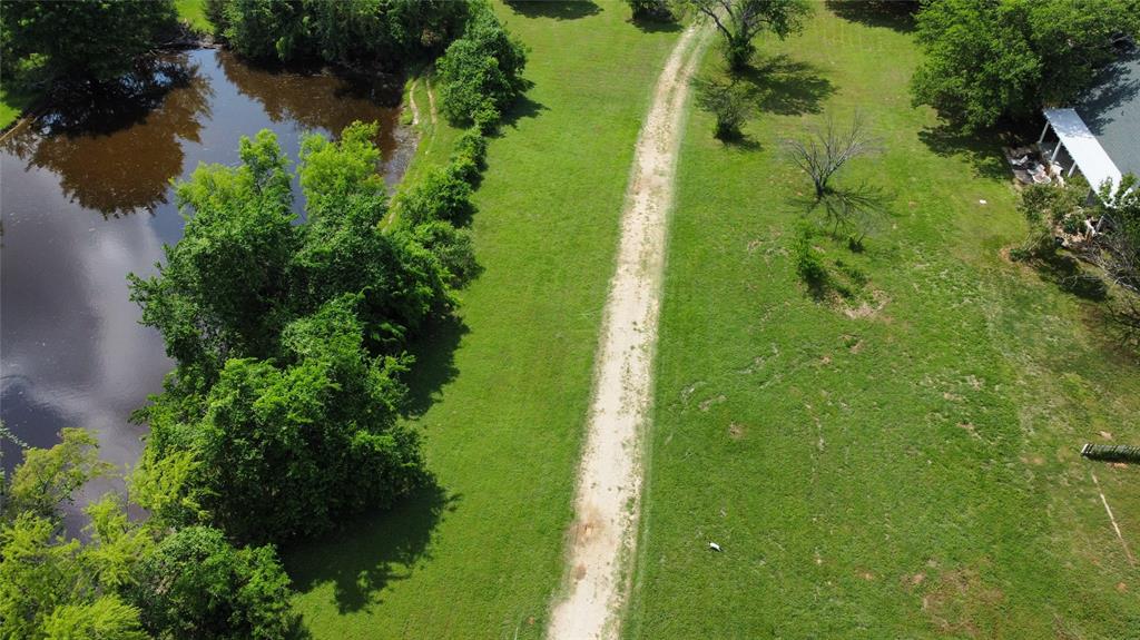 806 Old Base Road Aurora, TX 76078 - Photo 2 of 23 view of a garden