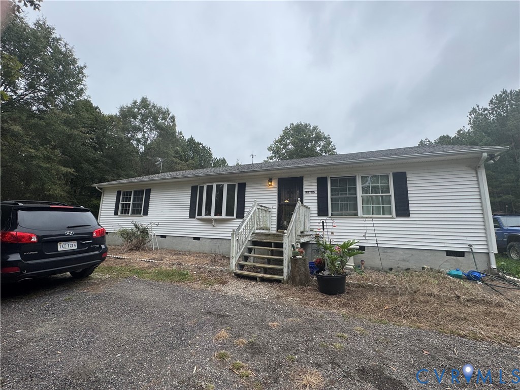 22725 Shippings Road McKenney, VA 23872 - Photo 1 of 1 a front view of a house with a garden