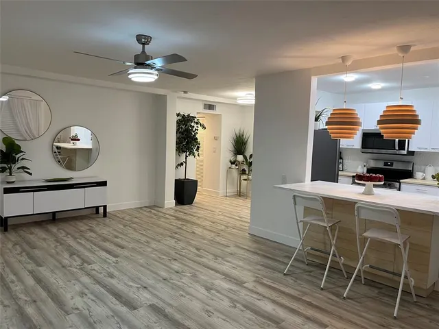 a view of kitchen with breakfast area