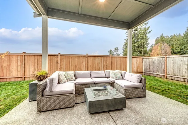 a outdoor living space with furniture and garden view