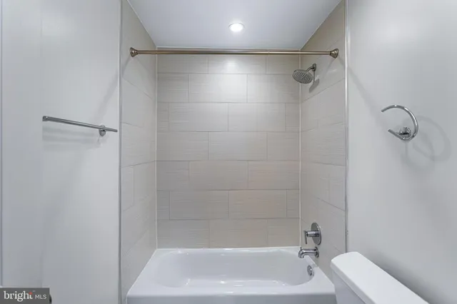 a close view of a bathtub in bathroom