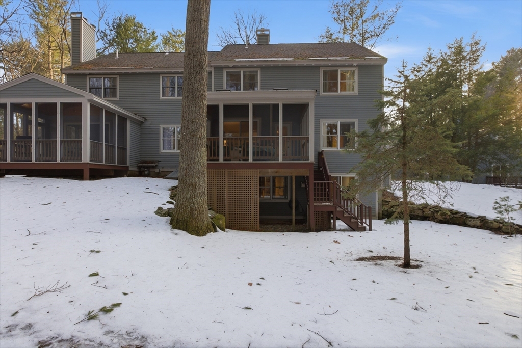 18 Quail Run, Unit 18 Acton, MA 01720 - Photo 21 of 23 a front view of a house with a yard