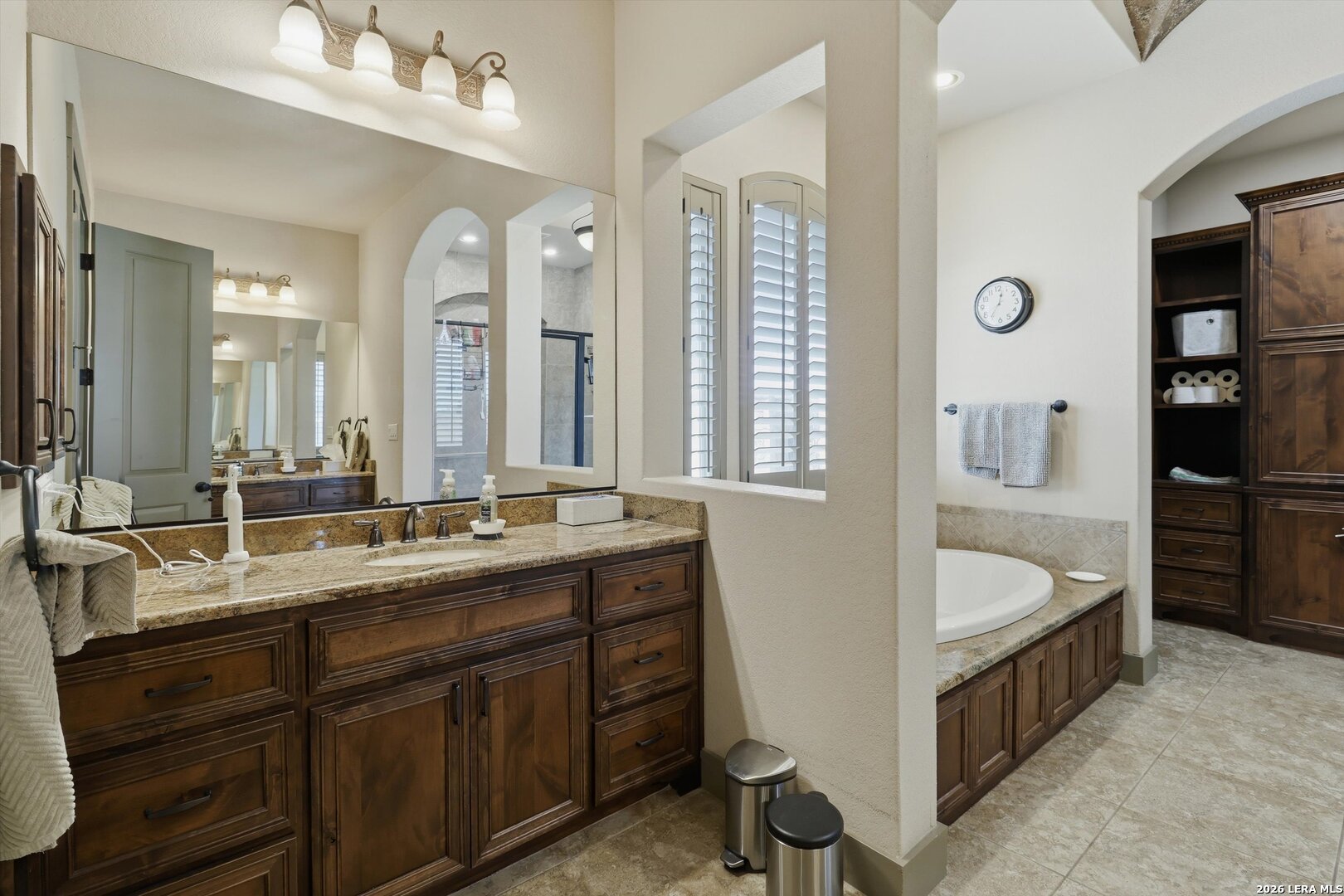 439 Mystic Parkway Spring Branch, TX 78070 - Photo 19 of 39 a spacious bathroom with a double vanity sink mirror double and bathtub