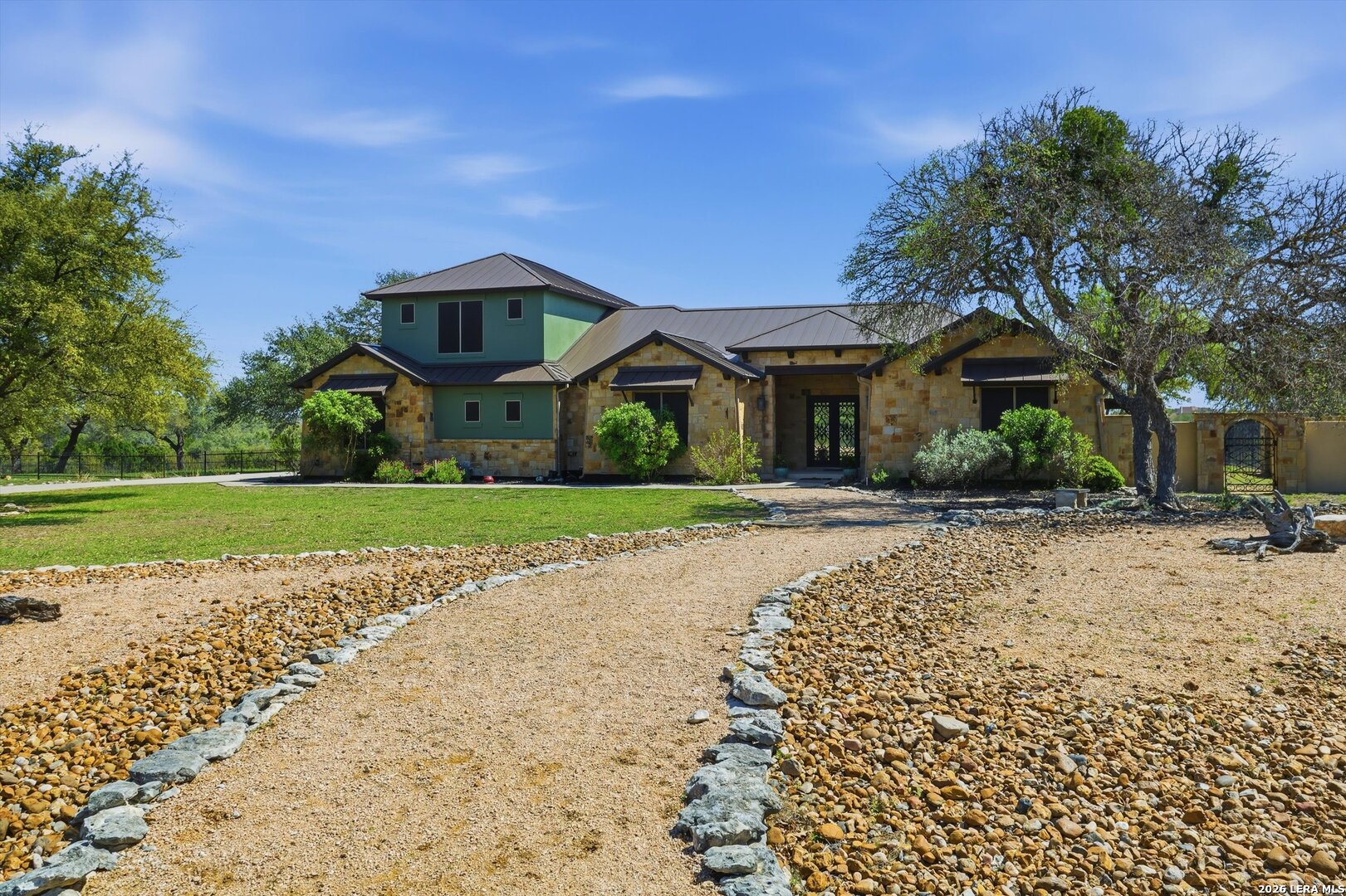 439 Mystic Parkway Spring Branch, TX 78070 - Photo 2 of 39 a front view of a house with a yard