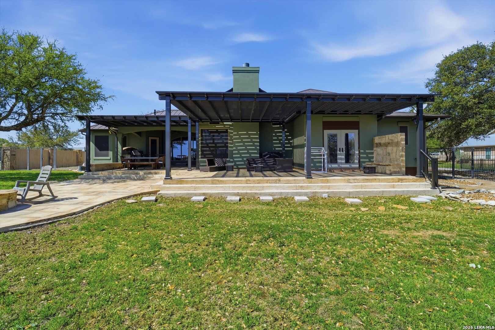 439 Mystic Parkway Spring Branch, TX 78070 - Photo 29 of 39 a swimming pool with outdoor seating and yard