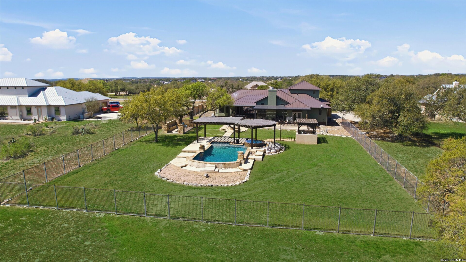 439 Mystic Parkway Spring Branch, TX 78070 - Photo 35 of 39 an aerial view of a house with swimming pool garden and patio