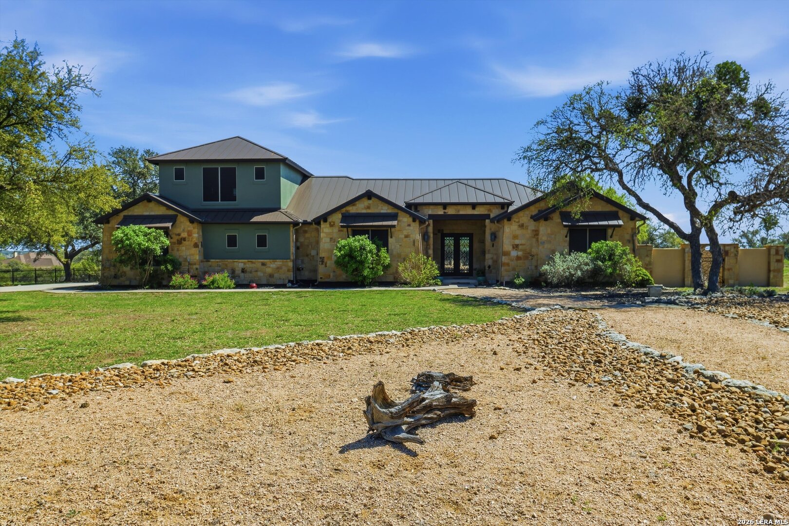 439 Mystic Parkway Spring Branch, TX 78070 - Photo 4 of 39 a front view of a house with a yard