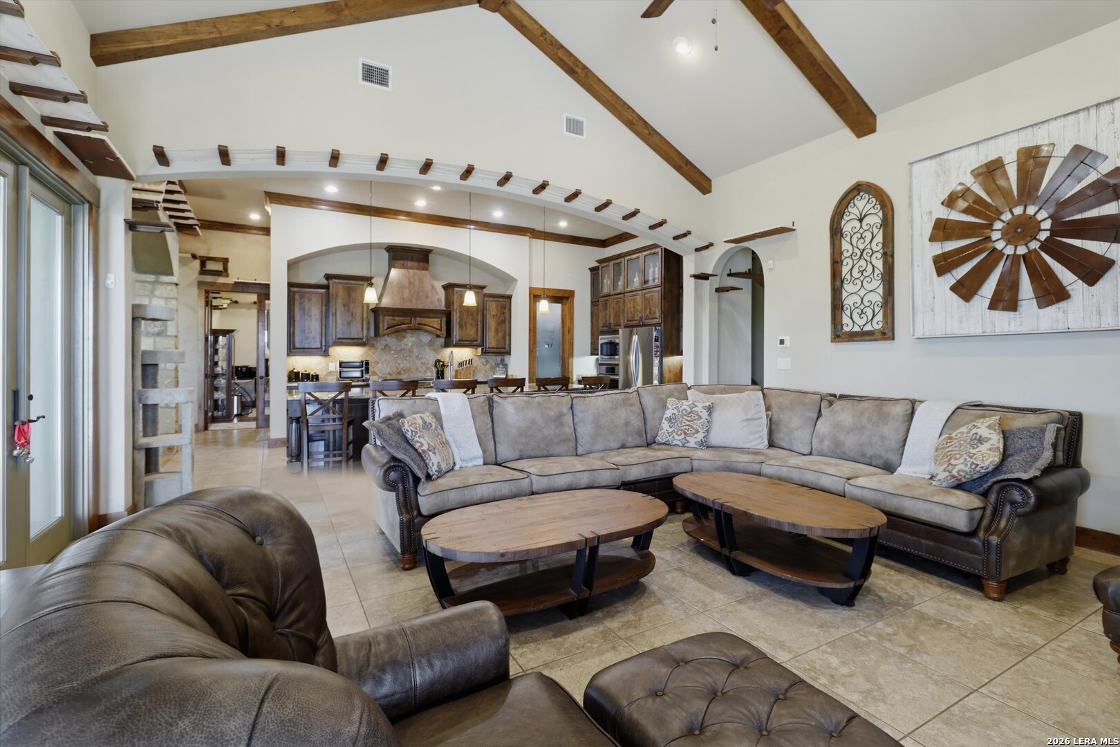 439 Mystic Parkway Spring Branch, TX 78070 - Photo 7 of 39 a living room with furniture kitchen view and a chandelier