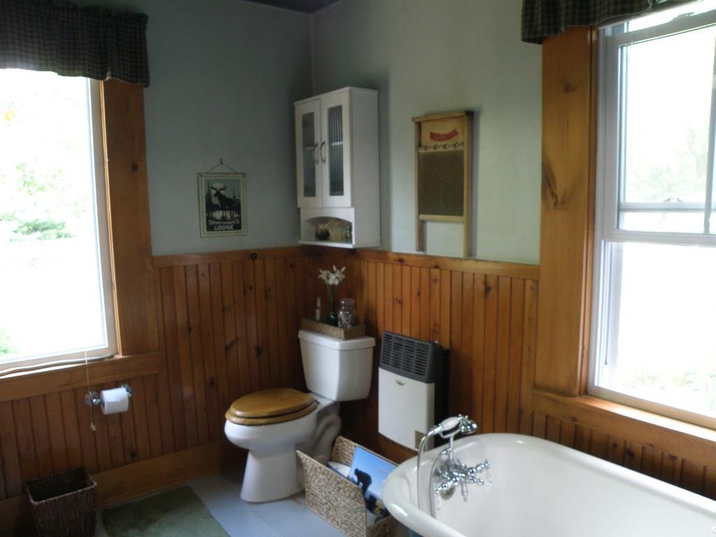 197 Tannery Loop Ellsworth, ME 04605 - Photo 8 of 34 1st flr bathroom w/clawfoot tub....