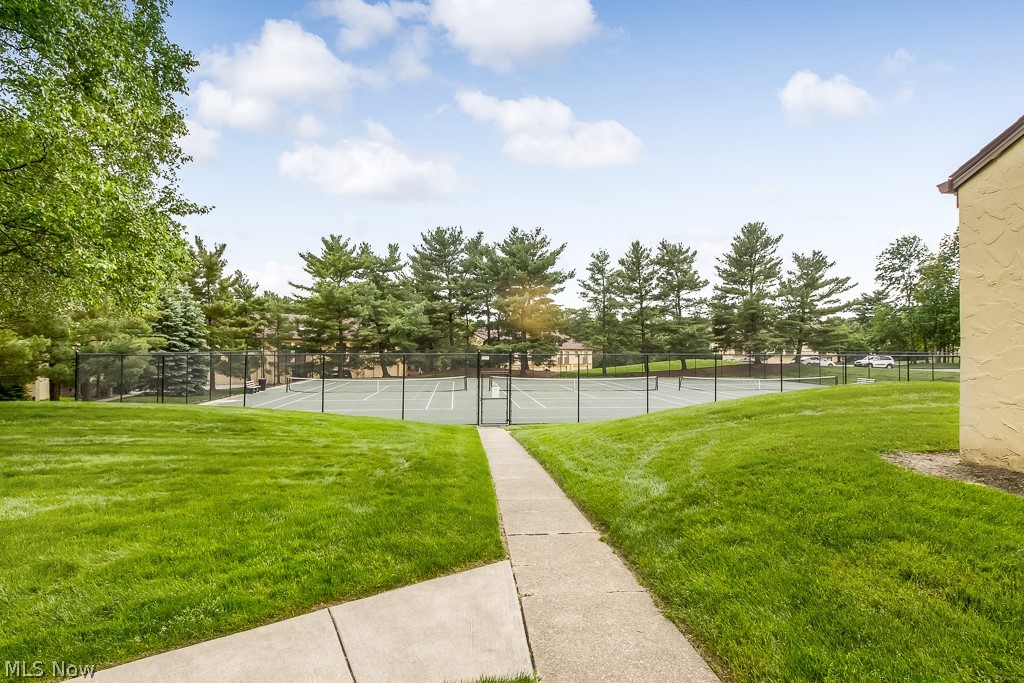452 Hampton Ridge Drive Akron, OH 44313 - Photo 23 of 25 Tennis courts, walking and bike trails along 70 well-landscaped acres adjacent to Nature Realm on the east and The Cuyahoga Valley National Park on the south.