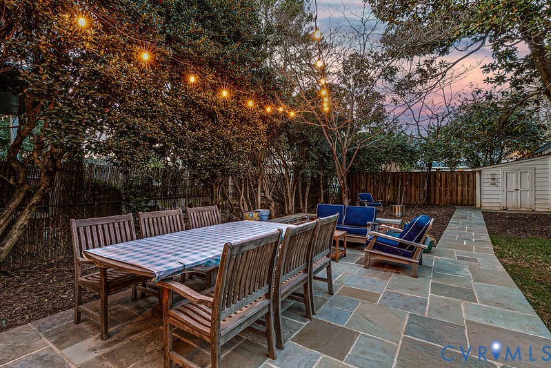 4617 Sylvan Road Richmond, VA 23225 - Photo 2 of 33 a view of backyard with seating space and trees