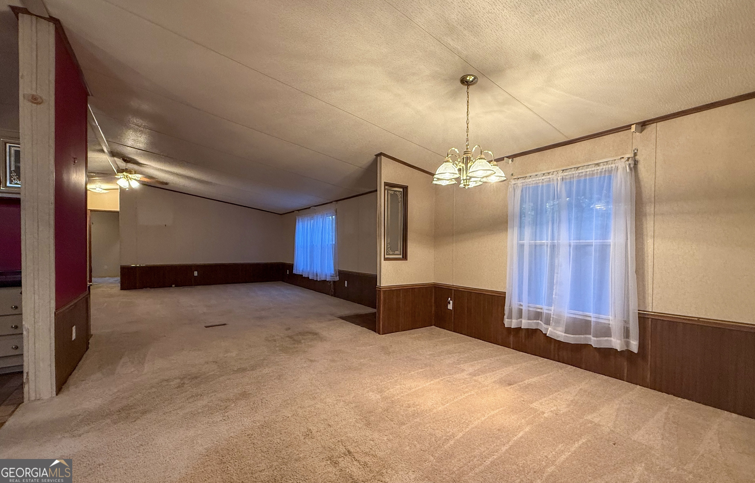 431 Paradise Valley Road Cleveland, GA 30528 - Photo 14 of 27 a view of a windows and chandelier fan in a room