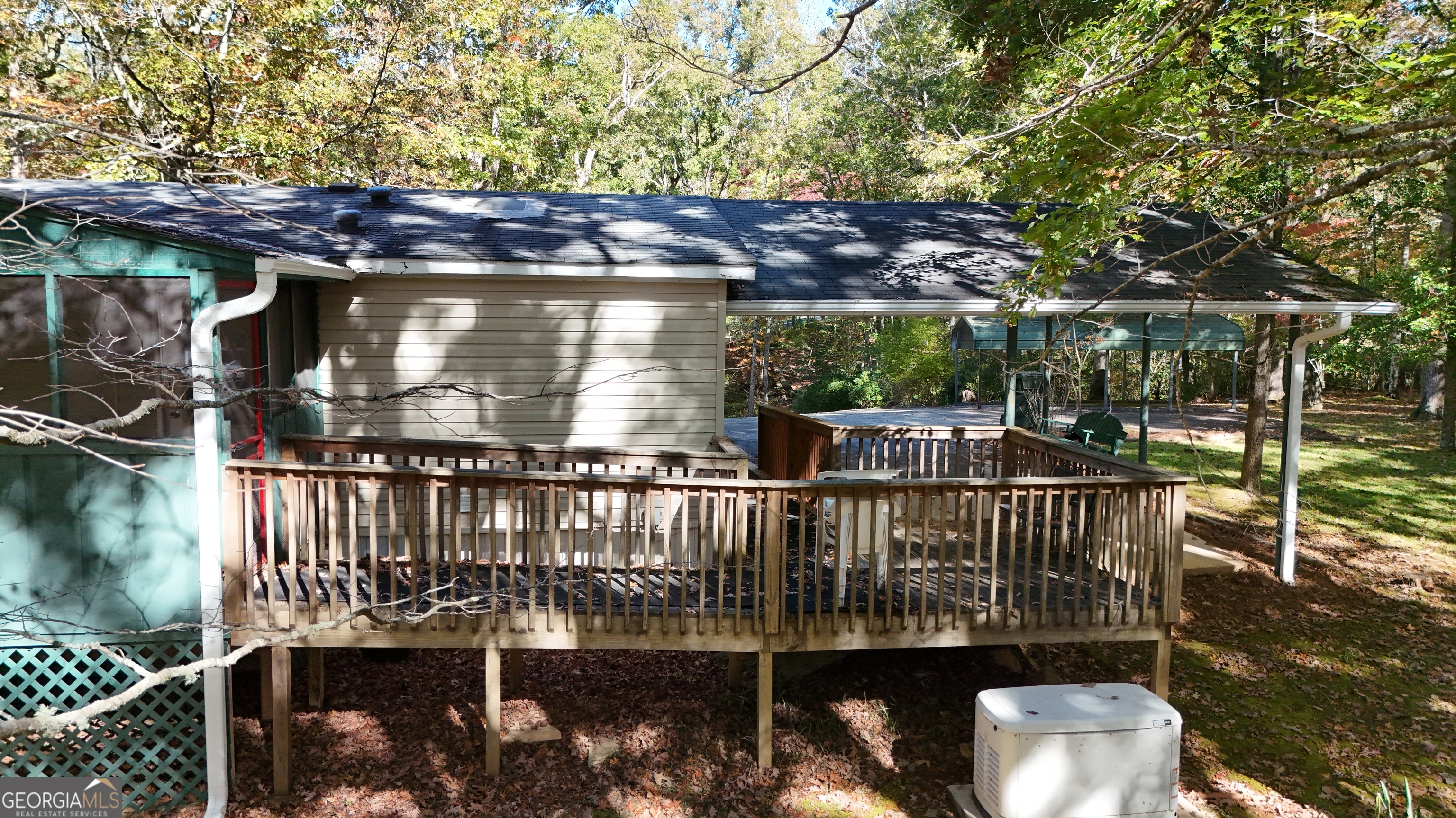431 Paradise Valley Road Cleveland, GA 30528 - Photo 22 of 27 a view of a balcony with two chairs and a table