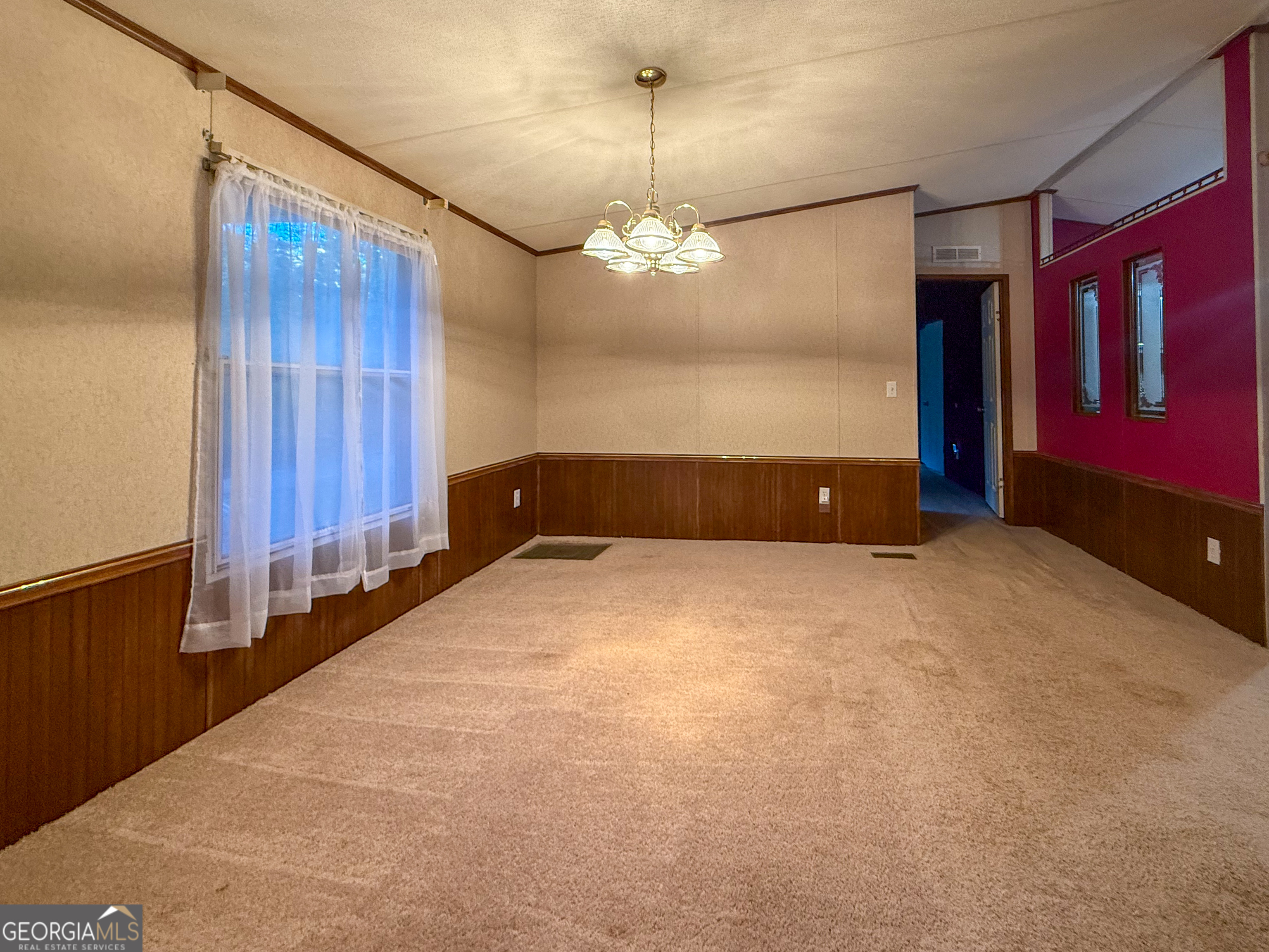 431 Paradise Valley Road Cleveland, GA 30528 - Photo 5 of 27 a view of an empty room with a window