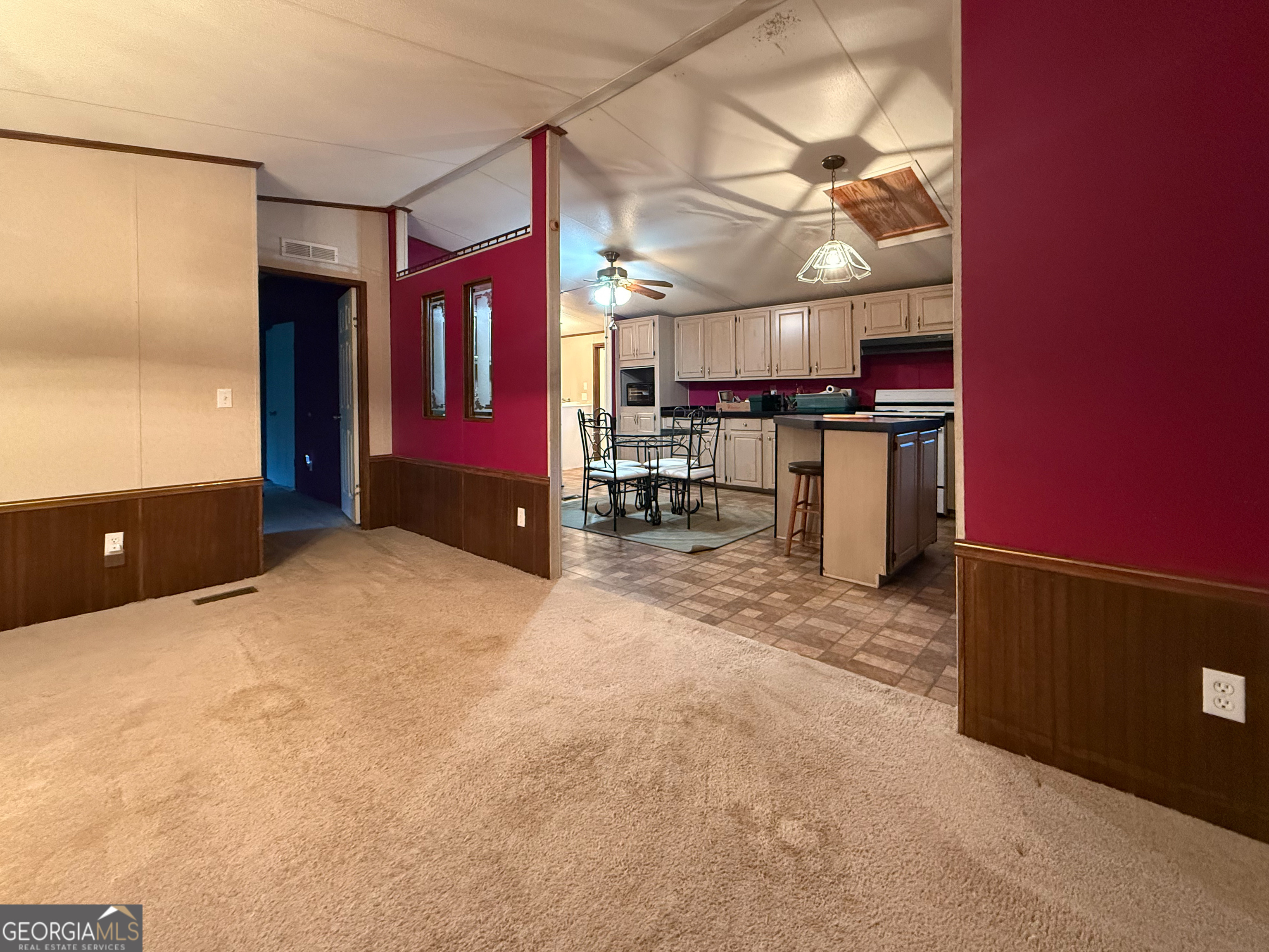 431 Paradise Valley Road Cleveland, GA 30528 - Photo 6 of 27 a view of a room with furniture and chandelier