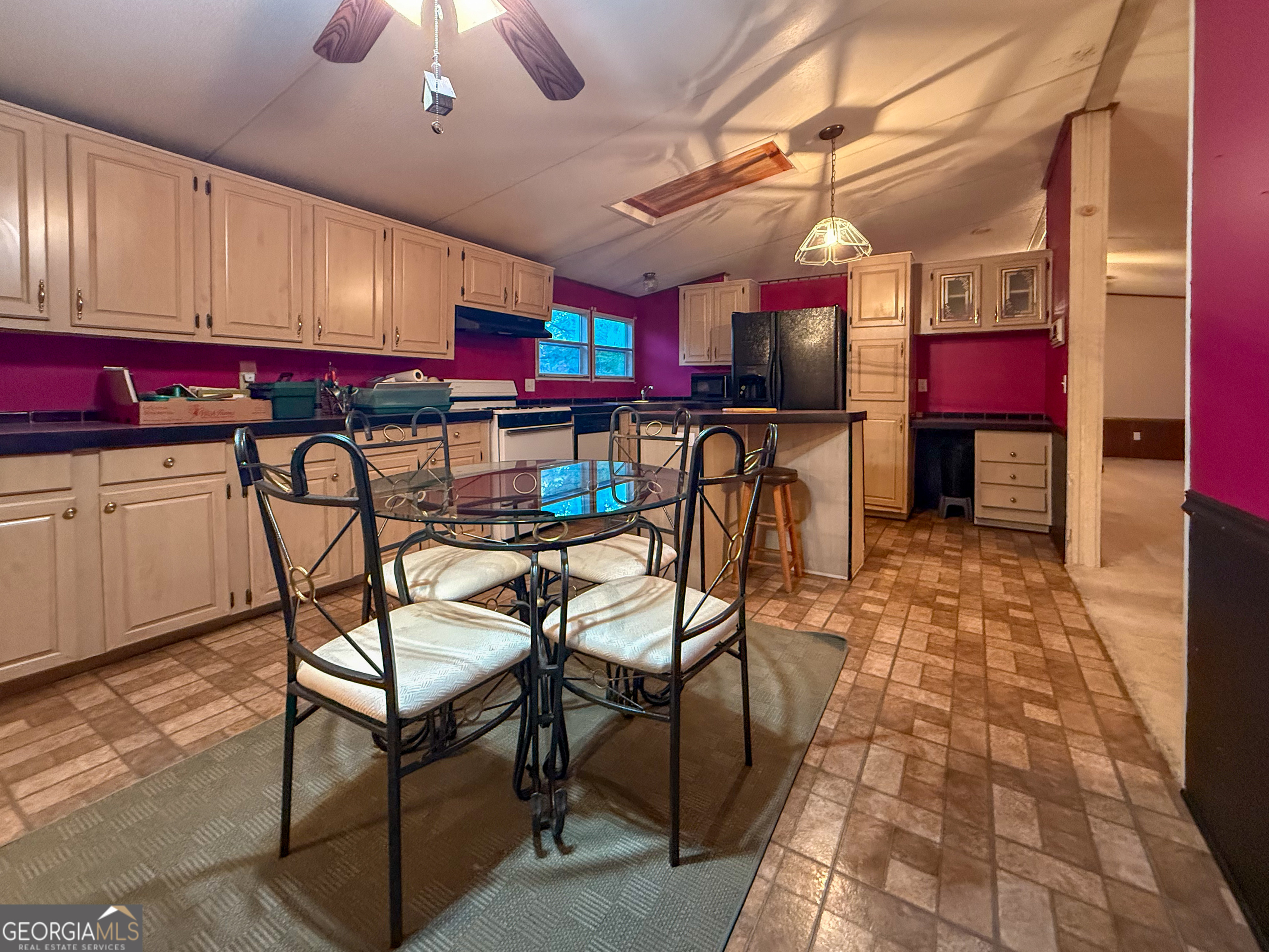 431 Paradise Valley Road Cleveland, GA 30528 - Photo 9 of 27 a view of a dining room with furniture