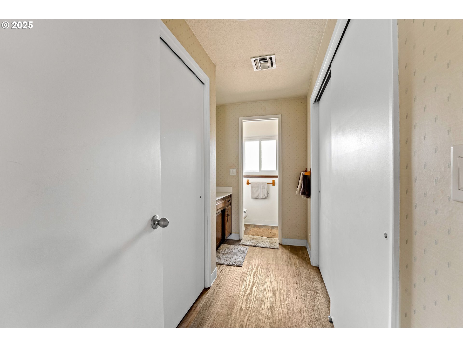 109 Hickory Drive Rogue River, OR 97537 - Photo 14 of 28 a view of a hallway with wooden floor
